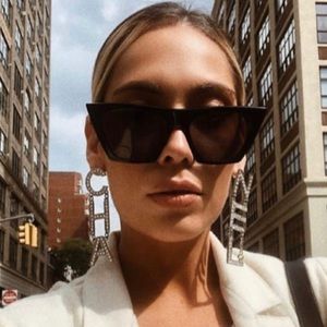 CHA NEL crystal logo earrings